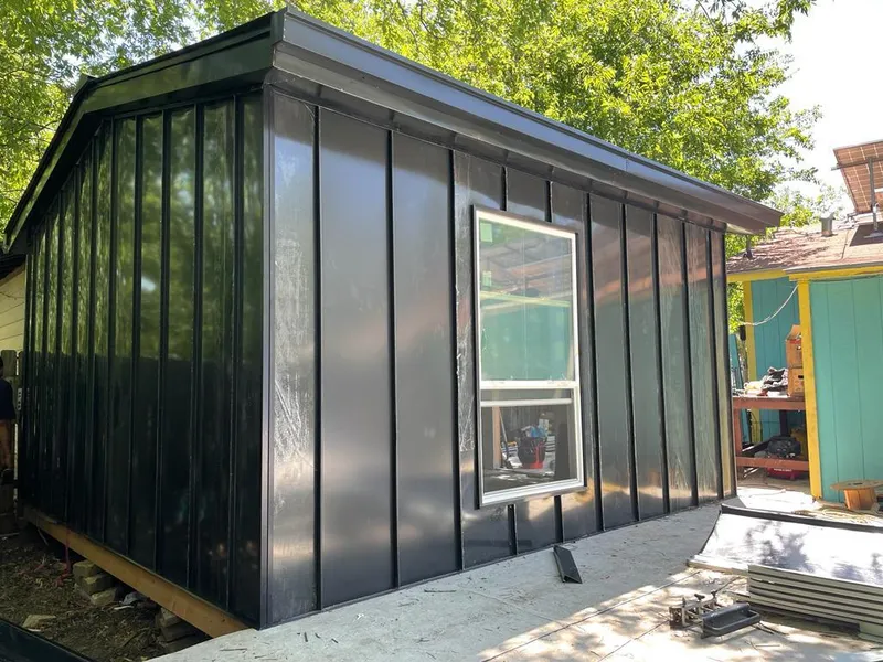 Black standing seam metal wall panels for Metal Roof Installation in Albert Lea