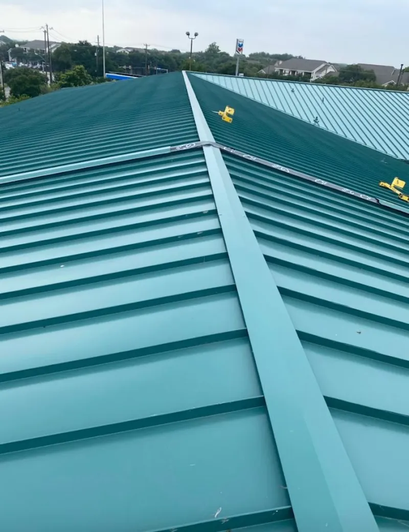 Green commercial metal roof ridge and valley for Metal Roof Repair in Albert Lea